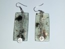 Jewelry from House Dust